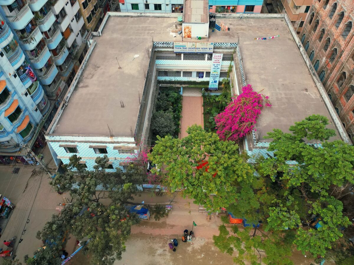 Aerial view of the Siraj Mia Memorial Model School campus with its garden courtyard